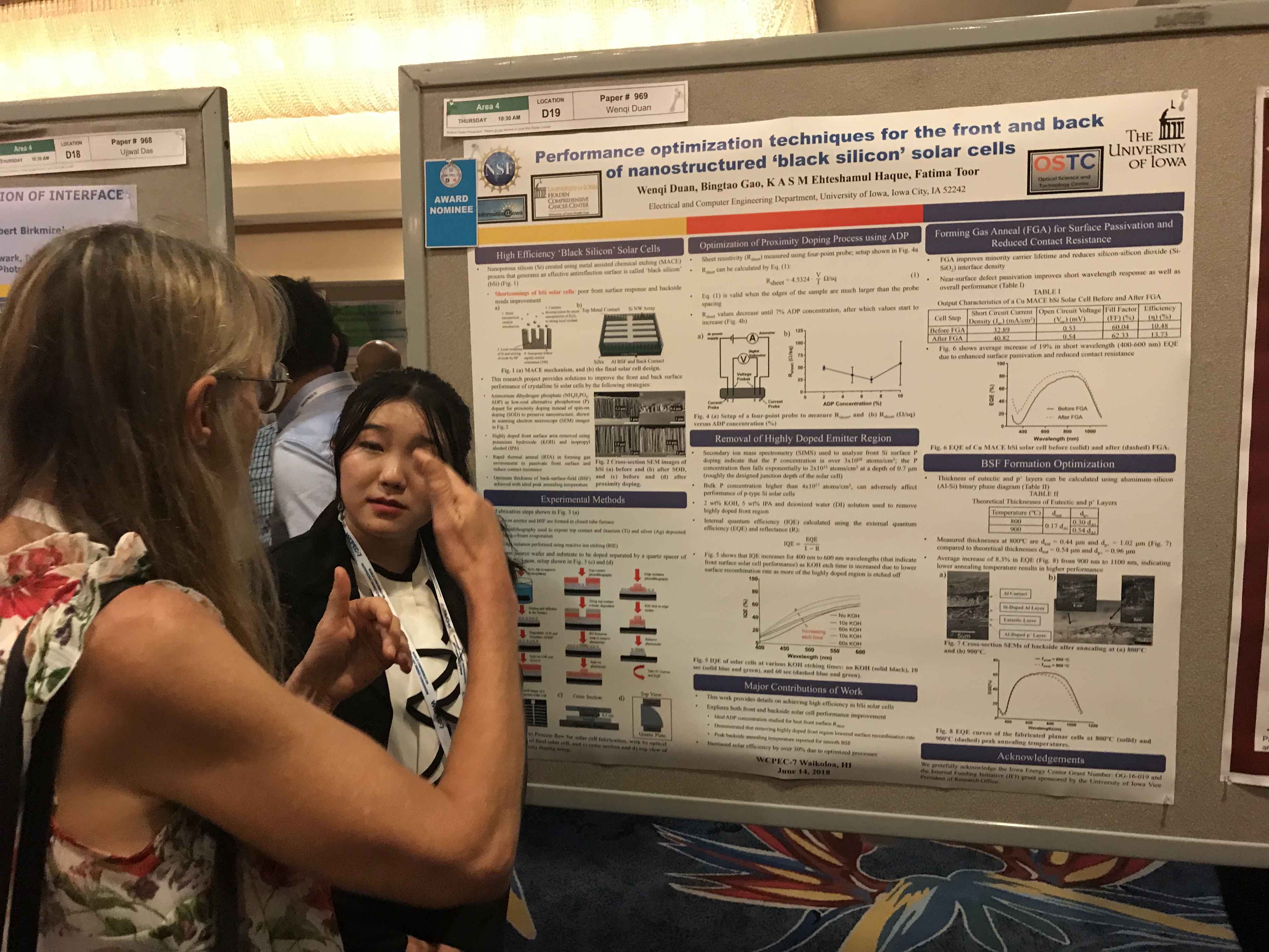 Wenqi discussing poster