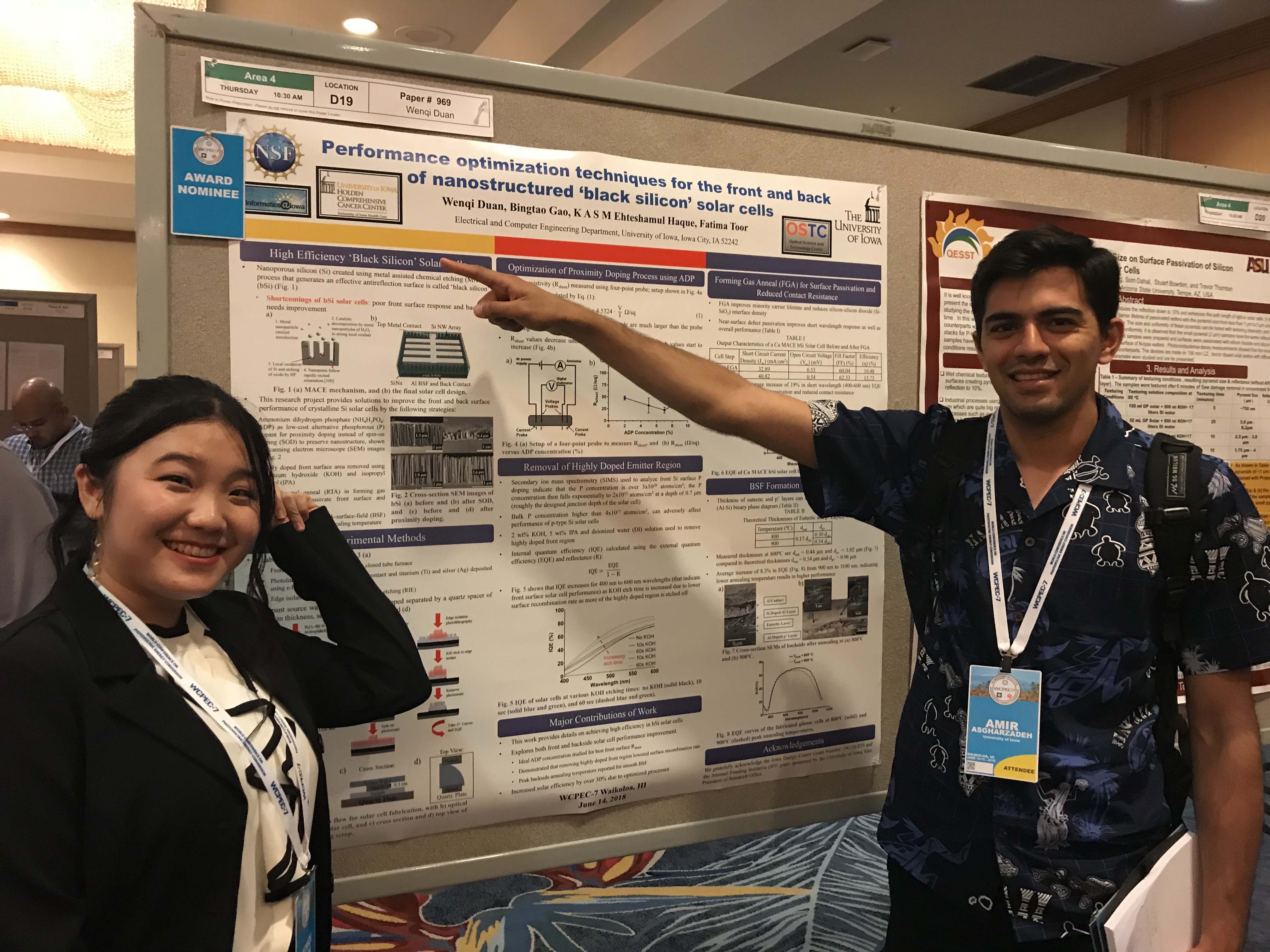 Wenqi and Amir with their poster